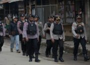 Dukungan Noken dan Kedekatan: Kapolres Dogiyai Patroli Sambil Borong Kerajinan Mama Papua